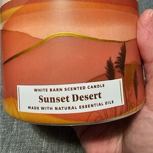White Barn Sunset Desert Candle with Orange and Gold Hues